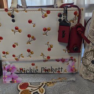 Coach Rogue 25 EUC Chalk with Cherries